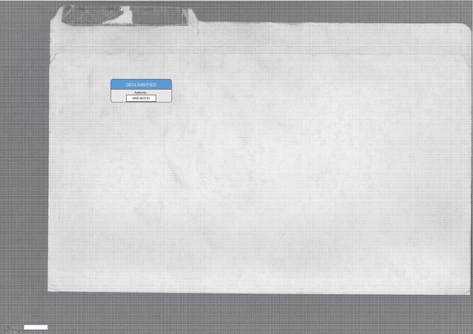 A file folder with a declassification sticker.