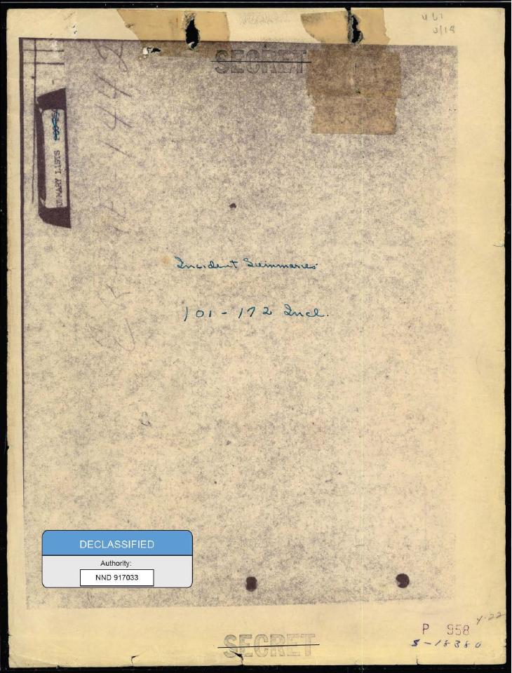 A file cover with notes and a declassification sticker.