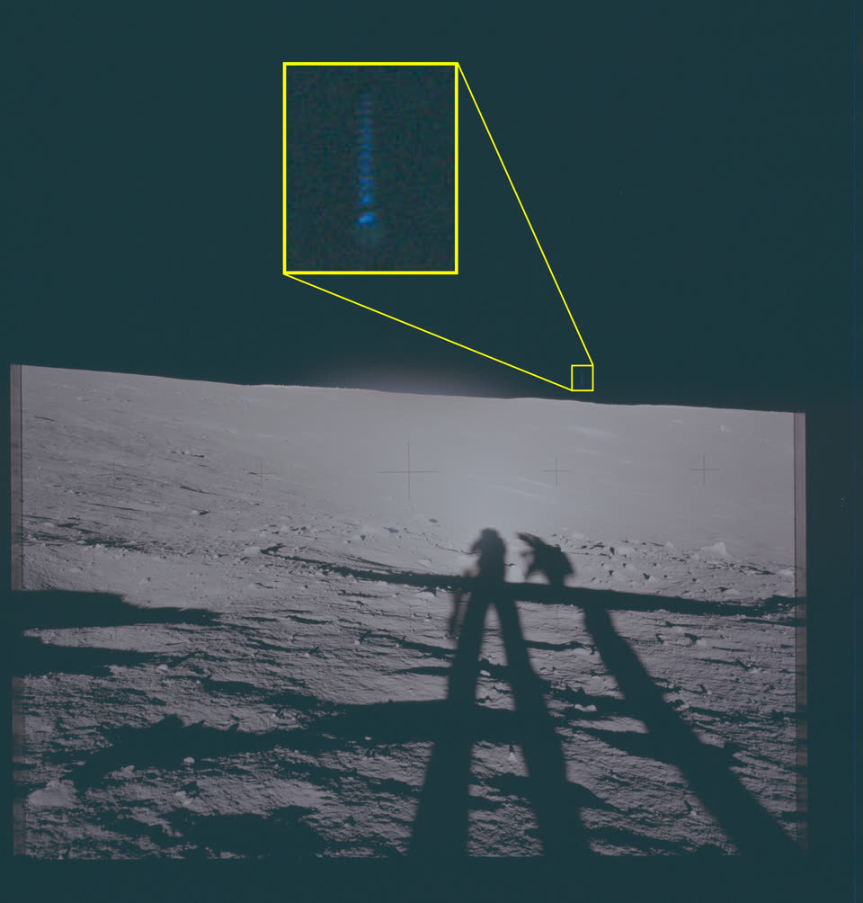 Photograph of the lunar surface showing astronaut shadows and a magnified callout of an object in the sky.