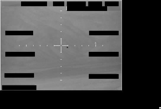 Redacted sensor image with a crosshair targeting reticle.